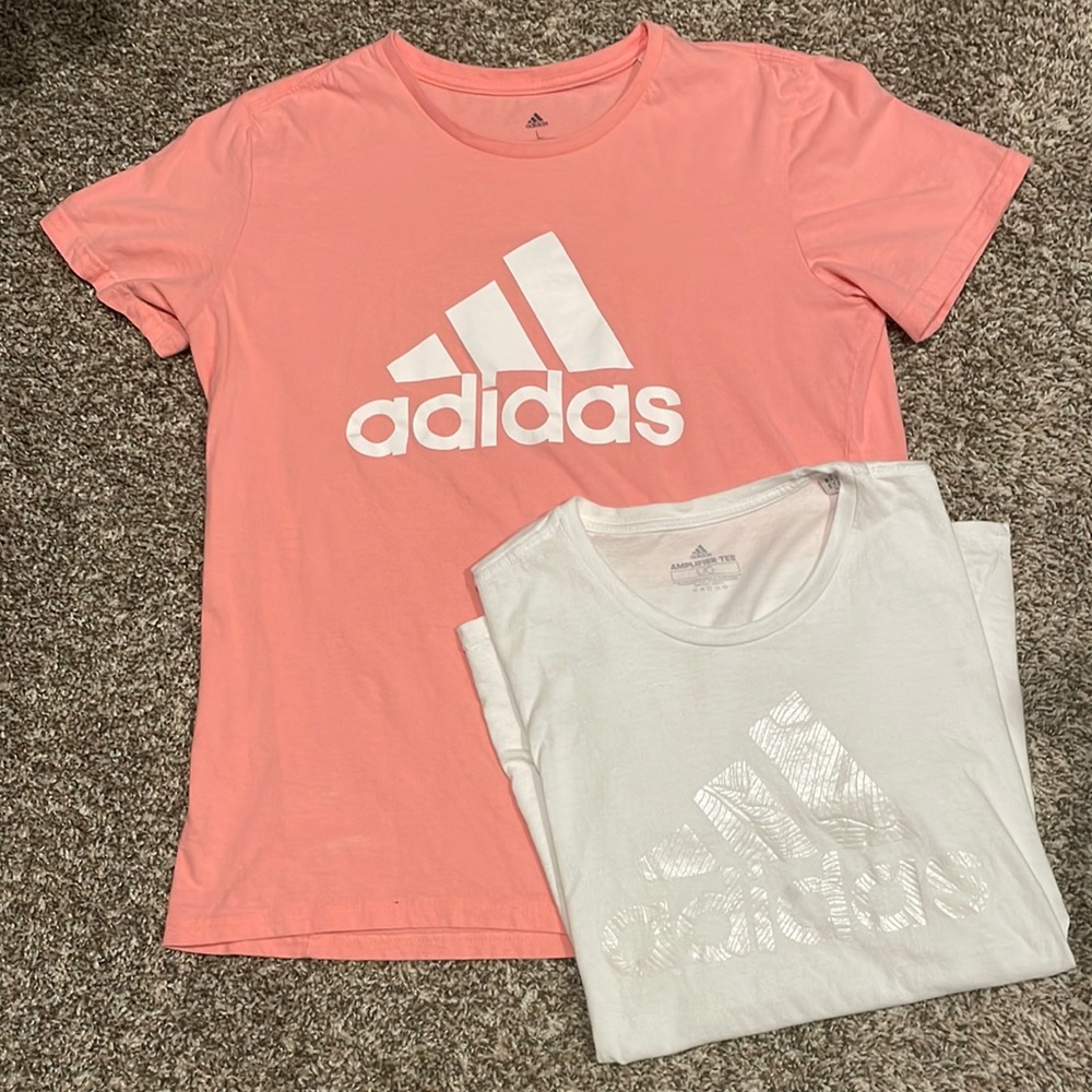 2 women’s large Adidas tshirts. The shirts are same size/style